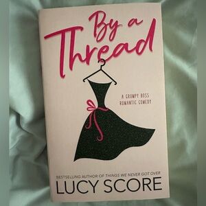 By a Thread by Lucy Score - Romantic Comedy Book